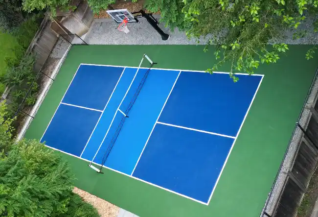 Residential pickleball court with acrylic flooring