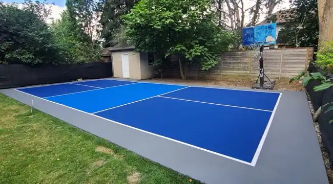 Residential pickleball court with acrylic flooring