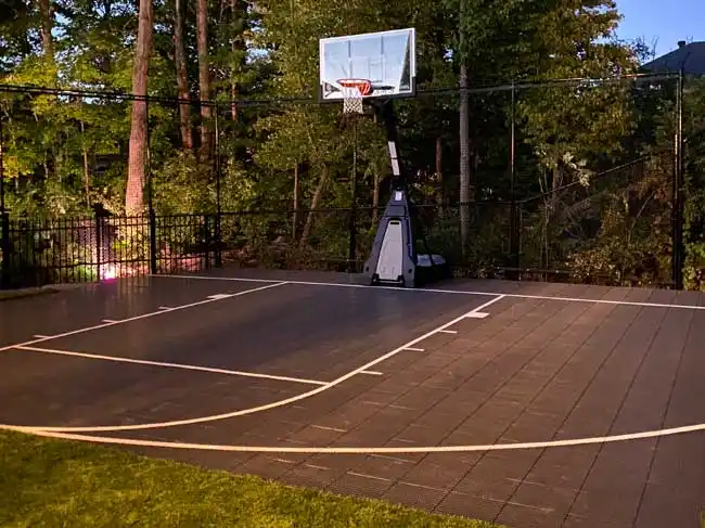Gallery of backyard court and home gym installations featuring SnapSports